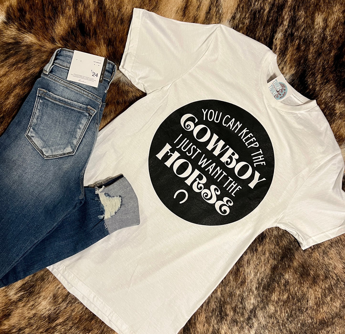 You can keep the cowboy graphic tee